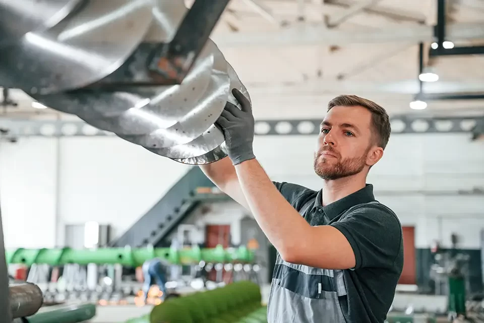 checking-slicing-parts-man-in-uniform-is-in-works Types of Vehicle Repair Services
