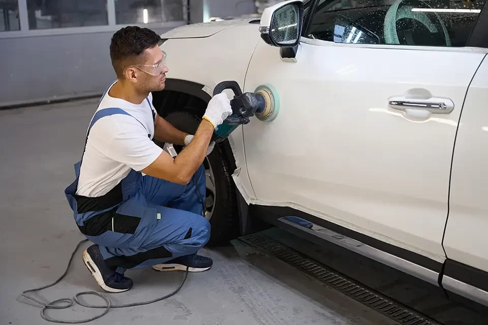 professional-worker-polishing-car-in-the-garage Why Choosing the "Best Lexus Auto Body Shop Near Me" Matters