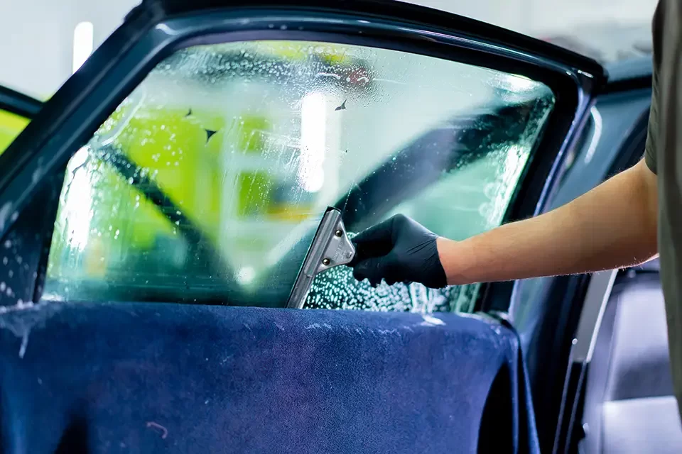 the-auto-mechanic-thoroughly-washes-the-car-glass Why is a Windshield Replacement Necessary?